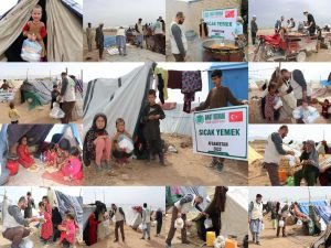 Umut Kervanı Vakfı Afganistan'daki kamplarda yüzlerce aileye sıcak yemek ikramında bulundu