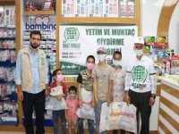 Umut Kervanı Siirt'te bayram öncesi 50 yetimi giydirdi