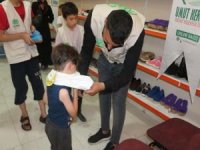 Mardin Umut Kervanı yetim ve muhtaç ailelere giyim yardımında bulundu