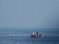 Filipinler, Güney Çin Denizi'ndeki yüzen bariyerleri kaldıracak