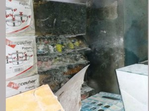 PKK'lılar müşterisiyle beraber marketi yakmak istedi