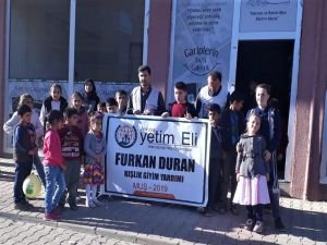 Muş Umut Kervanı ihtiyaç sahibi onlarca çocuğu giydirdi