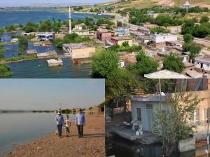 Gözyaşları içerisinde Ilısu Barajı sularının altında kalan köylerine bakıyorlar