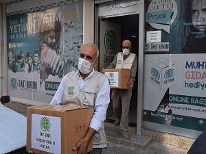 Umut Kervanı'ndan Kozan’daki yangın mağdurlarına yardım