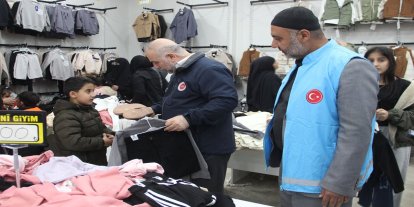 Cizre'de bin yetime bayramlık elbise yardımı yapıldı