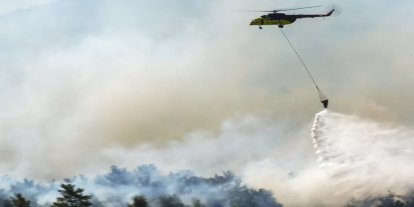 Balıkesir'de ormanlık alana sıçrayan yangın kontrol altına alındı