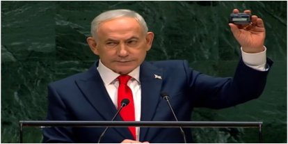 İşgalci Netanyahu, BM kürsüsünde elinde bombayla dünyayı tehdit etti