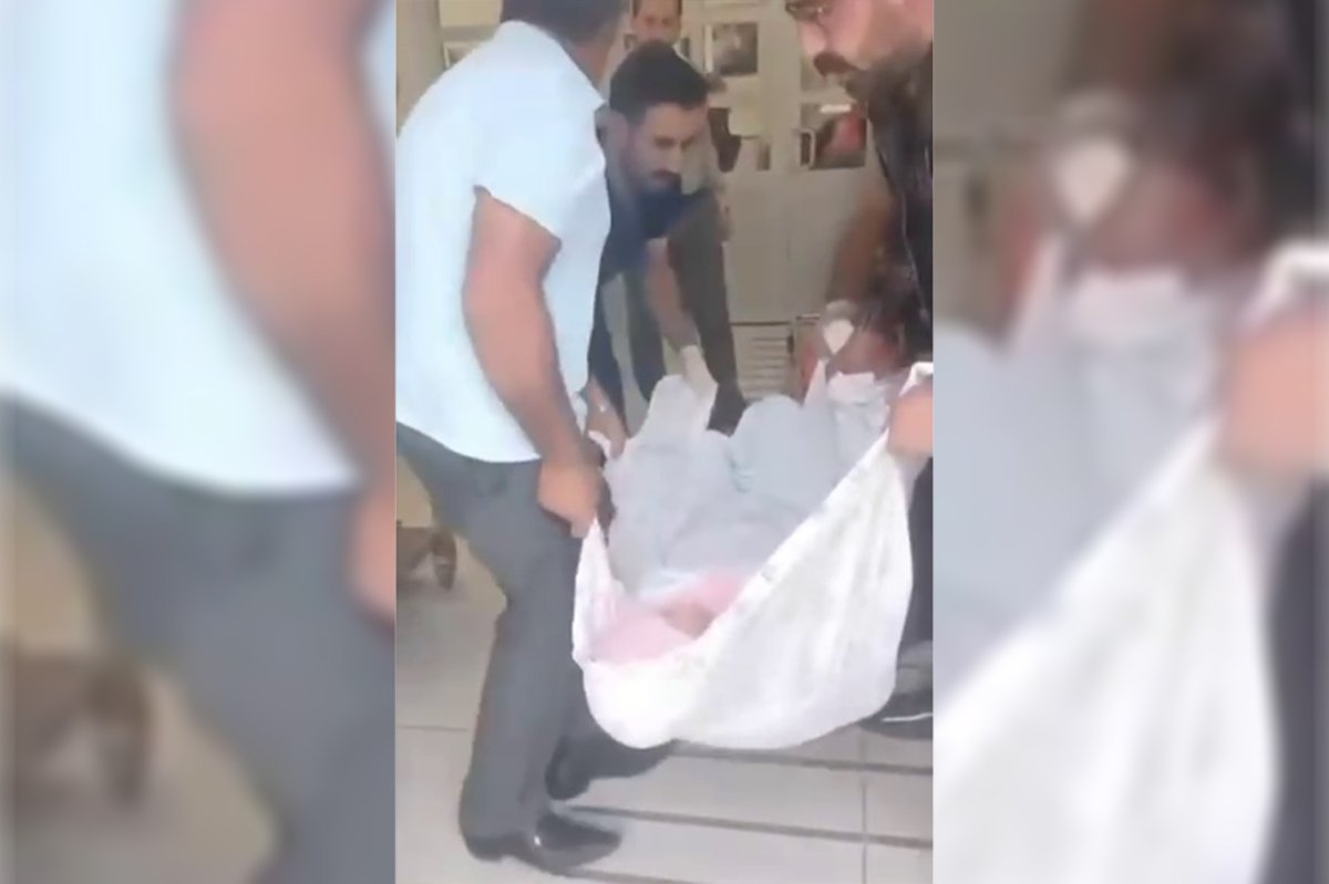 Ambulans talebi reddedilince eşini battaniyeye sarıp hastaneye taşıdı